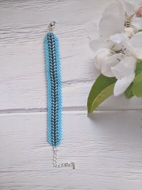 Handcrafted Light Blue Beaded Bracelet with Silver Accent